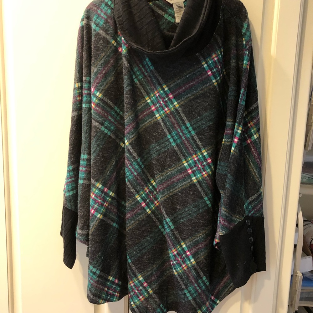 Multiples sweater with batwing sleeves with cuffs wit decorative buttons.